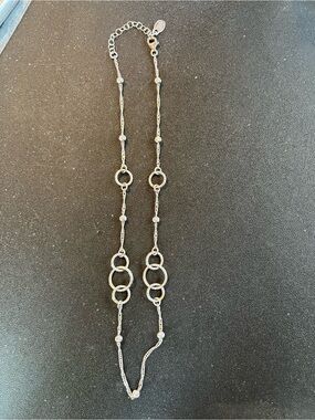 Sterling Silver Frederic Duclos 18” circle design necklace with gold accents.